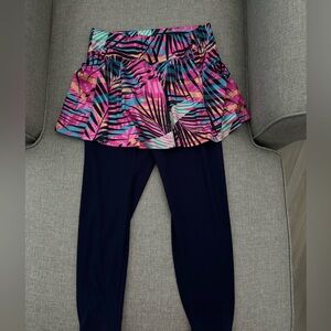 Tennis skirt with capri cotton leggings that are built in.